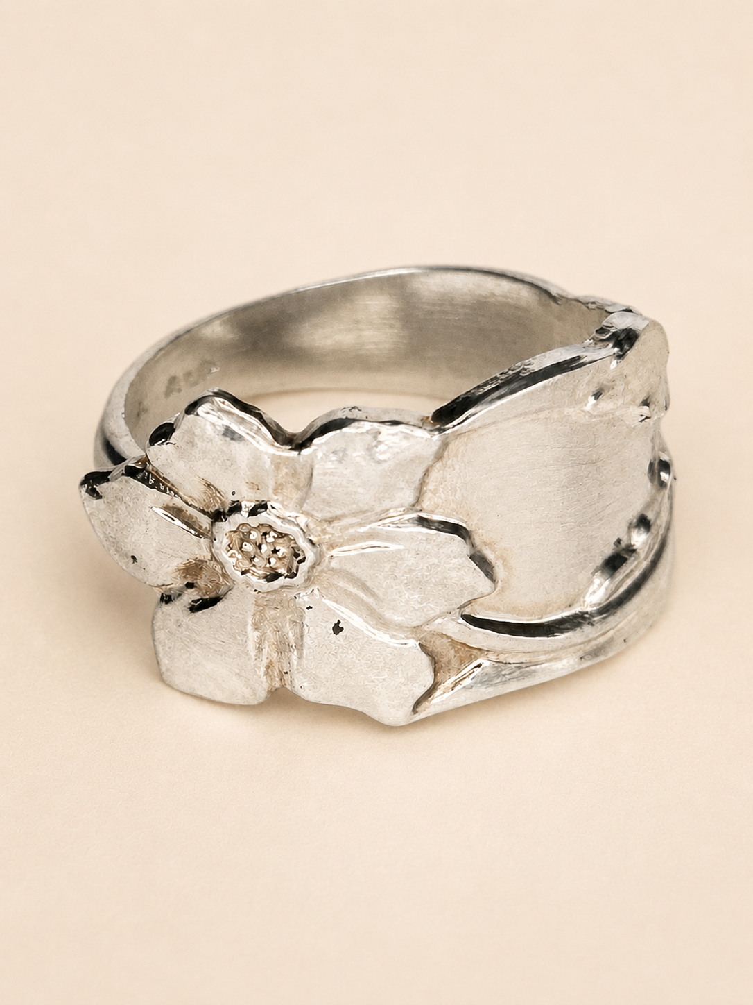Exotic flower spoon ring in Alpacca, front three-quarter view